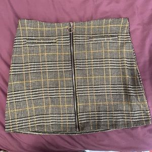 Black and yellow plaid skirt